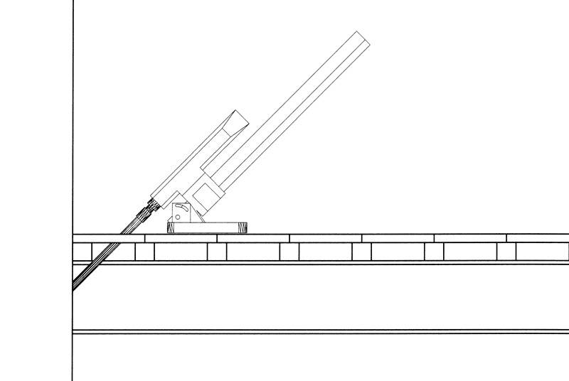 Fig. 7 – Perforazione nel muro per l’inserimento delle barre di ancoraggio. Soluzione senza smontaggio del solaio.